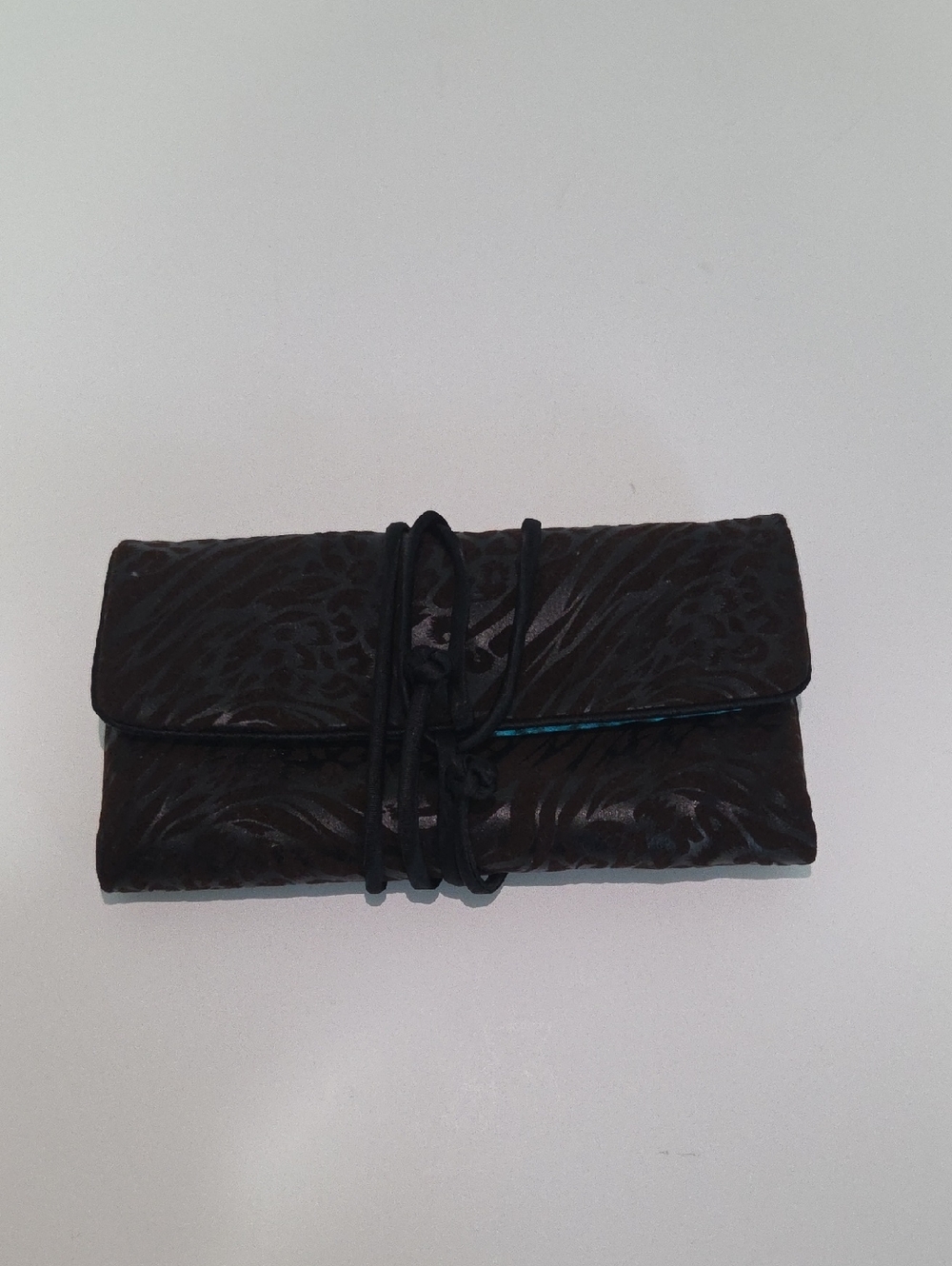 Embossed Black Wrap Jewelry Holder